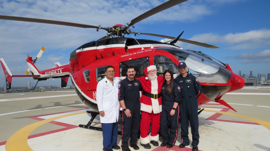 Santa Claus reunites with the medical team who saved his life after a critical cardiac event