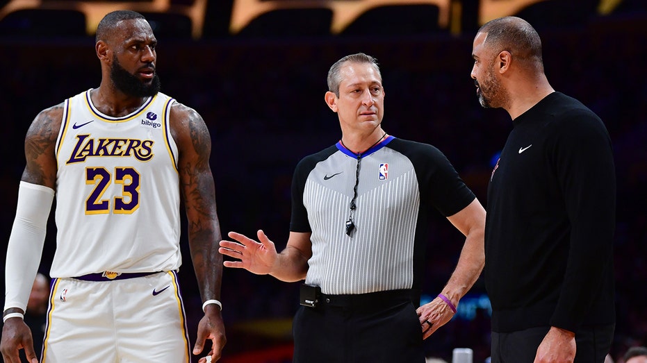 LeBron James, Rockets coach get into heated spat during game