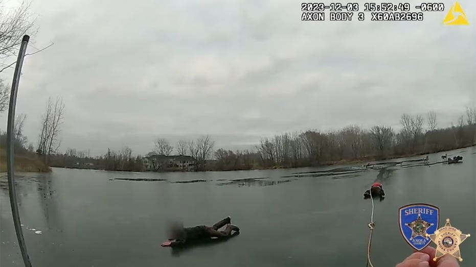 'Selfless' Minnesota deputy crawls across thin ice to rescue fishermen, dog: video