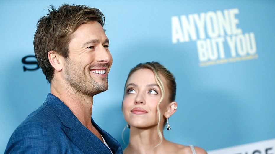 Glen Powell says he ‘almost died’ while stripping naked in front of Sydney Sweeney