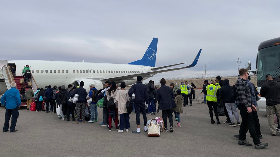 Texas begins flying migrants to sanctuary cities with first flight