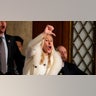 Rep. Marjorie Taylor Greene yells in the chambers as President Joe Biden