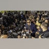 George Santos speaks to members of the media outside federal court