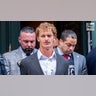 Daniel Penny exits a Manhattan police precinct.