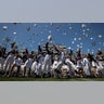 Graduating cadets toss their hats into the air at the end of the 2023 graduation ceremony at the United States Military Academy