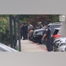 Rex Heuermann is led into Arthur M. Cromarty Criminal Complex