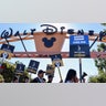 Striking SAG-AFTRA members and supporters picket outside Disney Studios