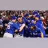 The Texas Rangers celebrate after winning the World Series