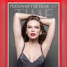 Taylor Swift has her arms over her head in dark grey sparkly dress for TIME cover