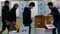 People vote for the presidential election at a polling station in southern Taiwan's Tainan city on Saturday, Jan. 13, 2024. Taiwanese are casting their votes Saturday for a new president in an election that could chart the trajectory of its relations with China over the next four years.