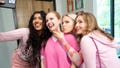 This scene from Mean Girls shows, from left, Avantika, Angourie Rice, Renee Rapp and Bebe Wood taking a selfie together.