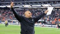 Interim head coach Antonio Pierce of the Las Vegas Raiders gestures to fans as he runs off the field after the team's 27-14 victory over the Denver Broncos at Allegiant Stadium on January 07, 2024 in Las Vegas, Nevada.