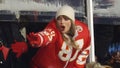 Taylor Swift celebrates with fans during the AFC Wild Card Playoffs between the Miami Dolphins and the Kansas City Chiefs at GEHA Field at Arrowhead Stadium on January 13, 2024 in Kansas City, Missouri.