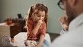 Cute little girl coughing during a medical exam with her pediatrician in hospital. - Fox News