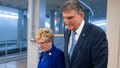 WASHINGTON, DC - FEBRUARY 4: Sen. Joe Manchin (D-WV) walks with his wife Gayle Conelly Manchin in the in the Senate subway at the U.S. Capitol on February 4, 2020 in Washington, DC. The Senate heard closing arguments yesterday after the Senate voted to block witnesses from appearing in the impeachment trial. The final vote is expected on Wednesday. (Photo by Alex Edelman/Getty Images)