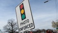 Commack, N.Y.: A traffic sign reads "photo enforced" to warn of a red light camera at Indian Head Rd. and Jericho Tpke. in Commack, New York on April 11, 2016. (Photo by Steve Pfost/Newsday RM via Getty Images)