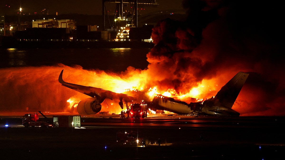 Airplane on fire, emergency crews