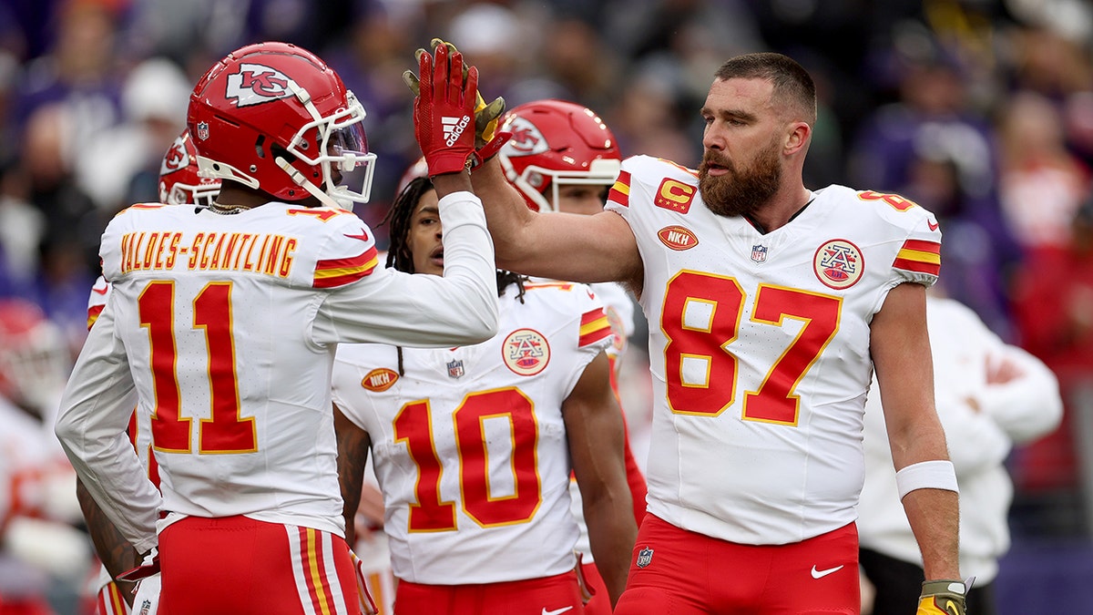 Travis Kelce high five