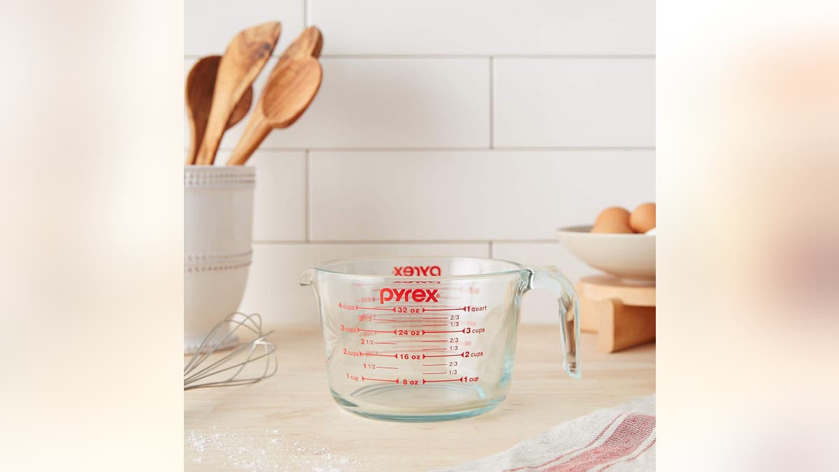 Measure any liquid in this glass mixing cup. 