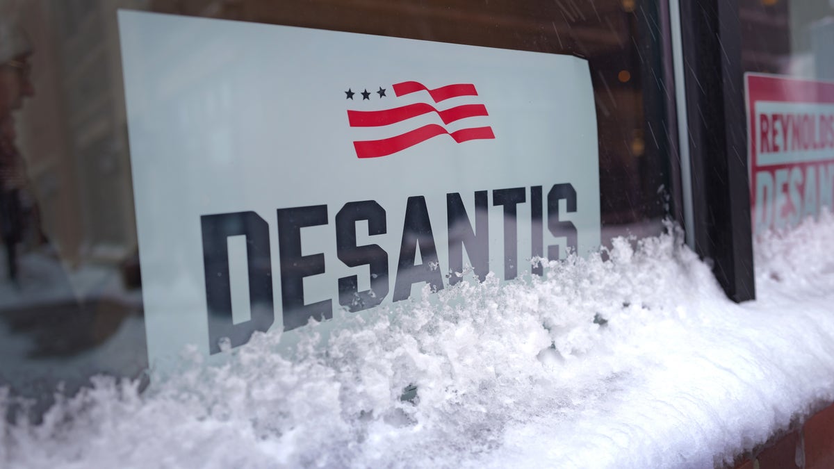 A campaign sign sits in the window for Ron DeSantis