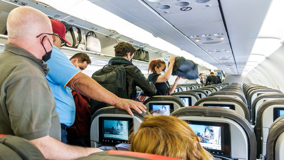 FILE - Keith Edward Fagiana allegedly got upset when another passenger complained that he had been kicking his seat.