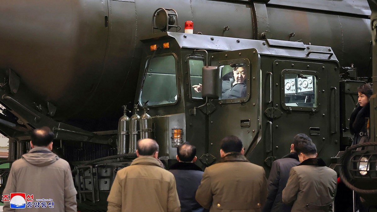 Kim in a military vehicle