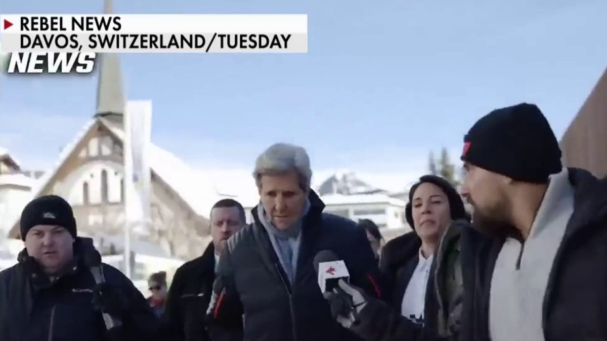 Reporter confronts John Kerry