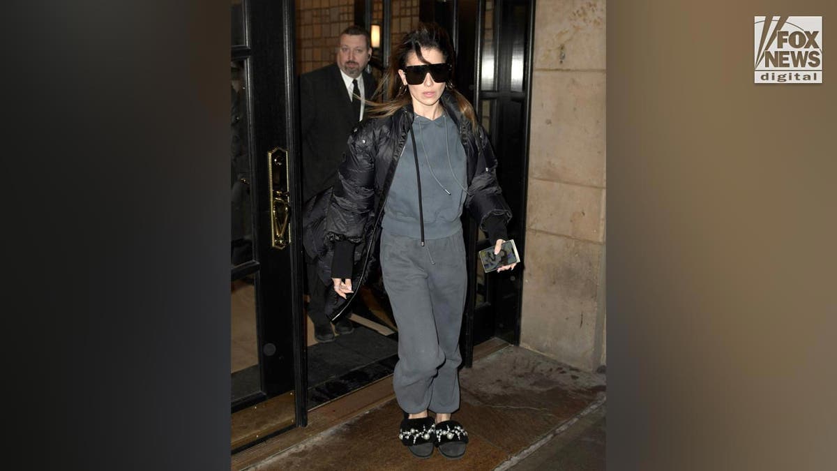 Alec Baldwin's wife Hilaria Baldwin exits her apartment building after her husband was indicted on involuntary manslaughter charges