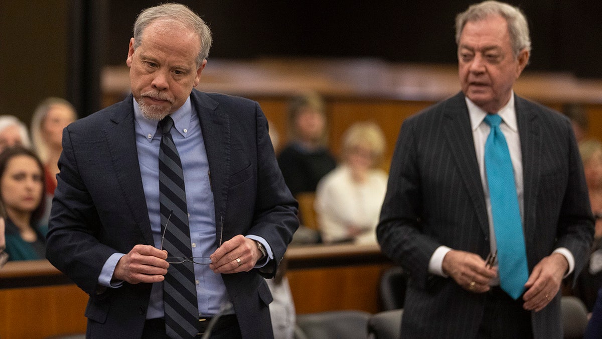 Prosecutor Creighton Waters, left, and defense attorney Dick Harpootlian stand during the Alex Murdaugh jury-tampering hearing at the Richland County Judicial Center