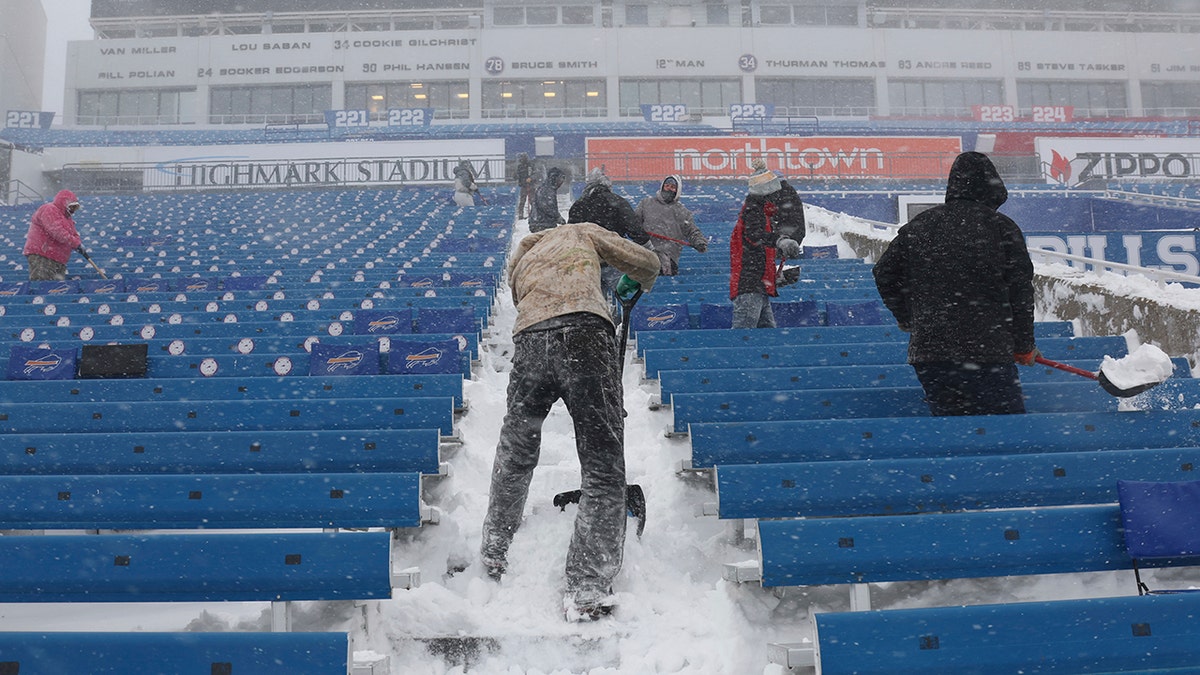 Shirtless Bills fan slides down chute as he shovels snow at Highmark