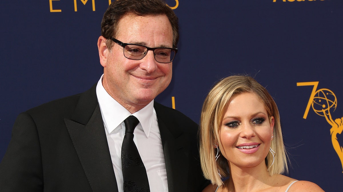 Bob Saget and Candace Cameron Bure at the 2018 Emmys