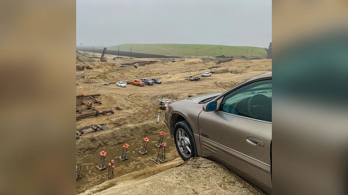 CHP driver on dirt mound