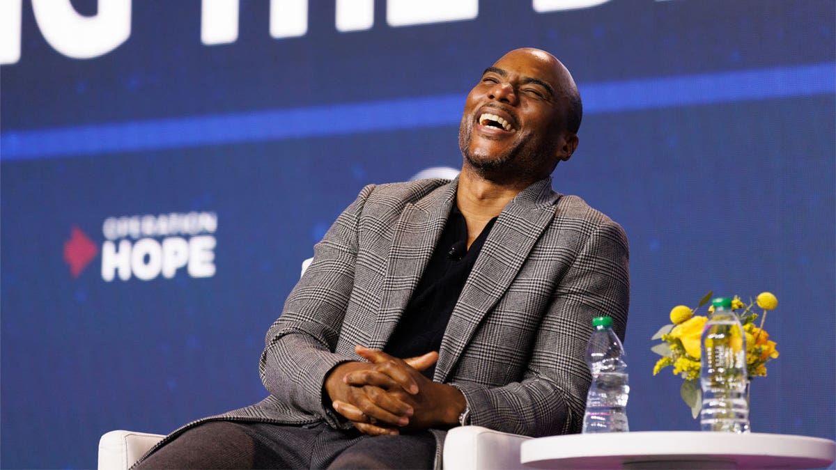 Charlamagne Tha God laughing