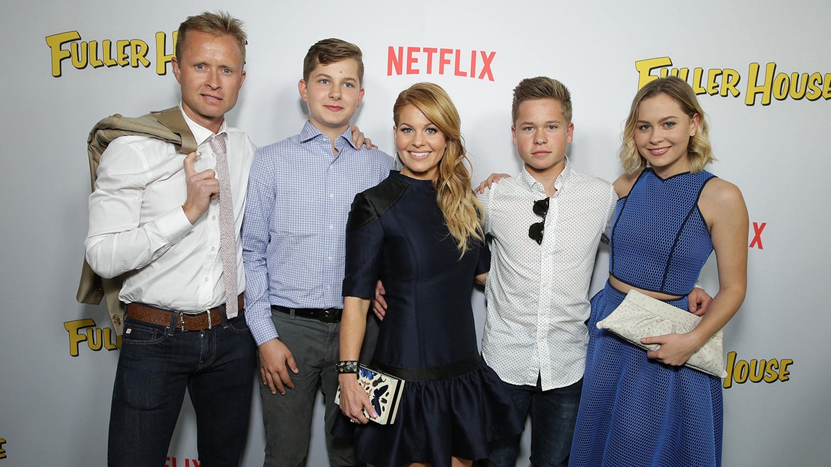 Candace Cameron Bure and family attend a premiere