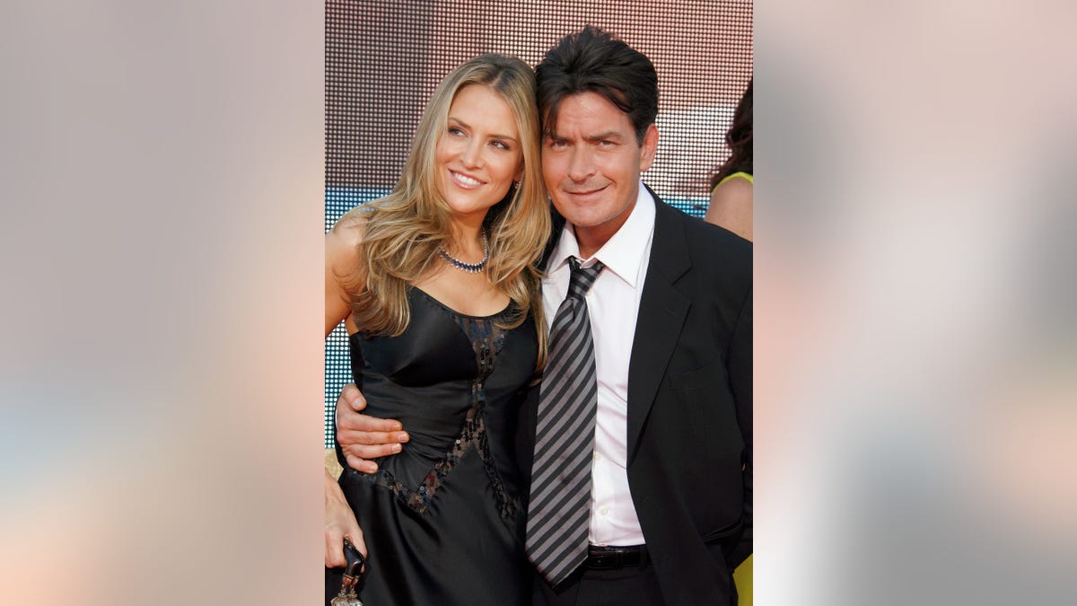 Charlie Sheen and Brooke Sheen on a red carpet