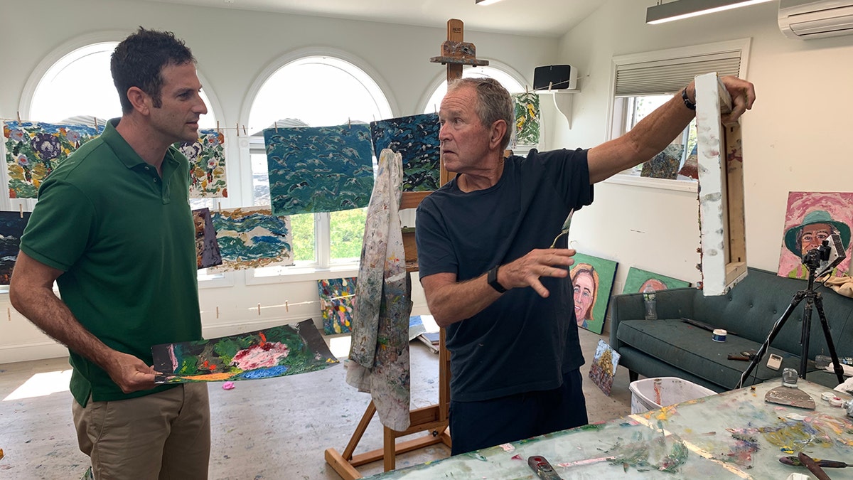 Jared Cohen and George W Bush in art studio
