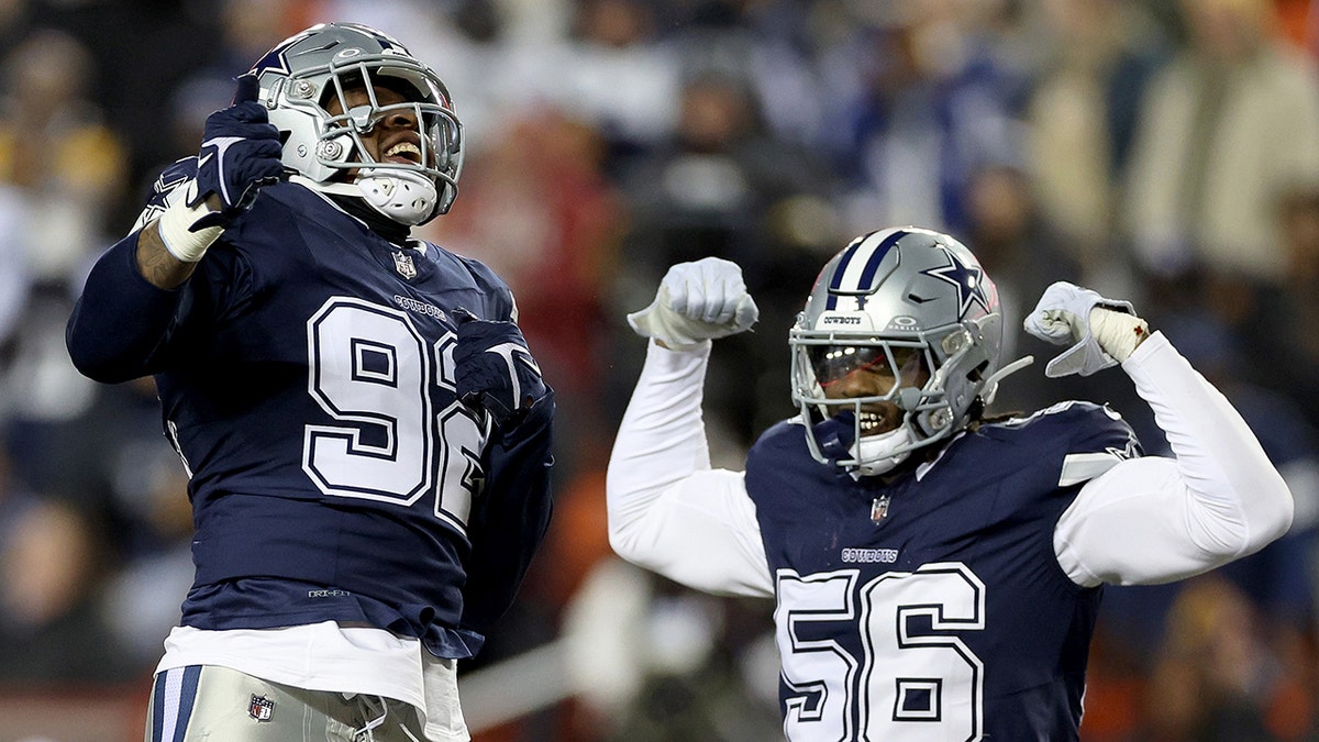 Cowboys take down Commanders to win NFC East title as Eagles’ struggles continue in loss to Giants 1 Cowboys defense celebrates play