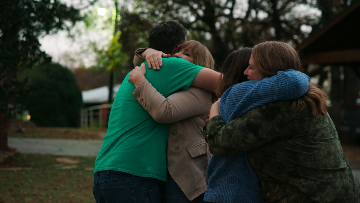 A group of LeBaron's surviving children can be seen embracing in a still from the five-part docuseries. Although they are uncertain exactly how many siblings they have, LeBaron's children estimated that there are about 50 to 55. 