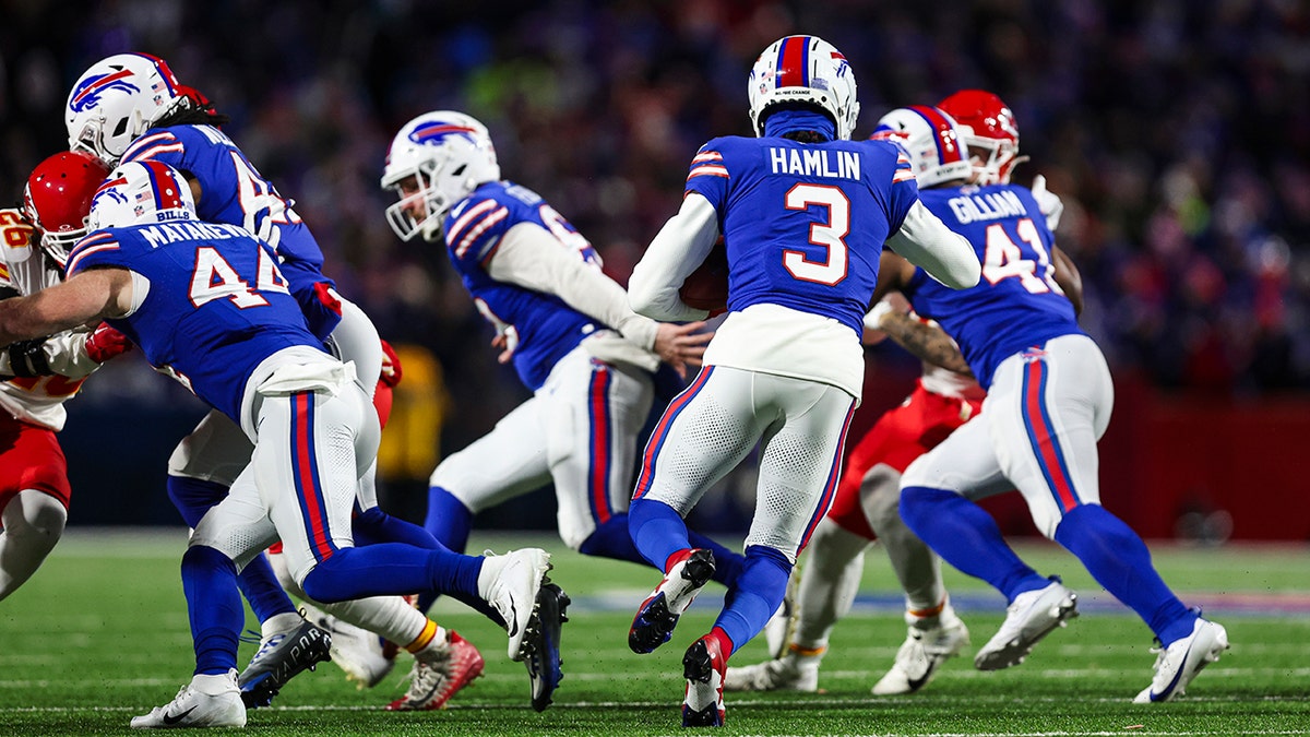 Damar Hamlin runs with ball