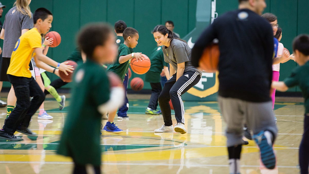 children playing basketball