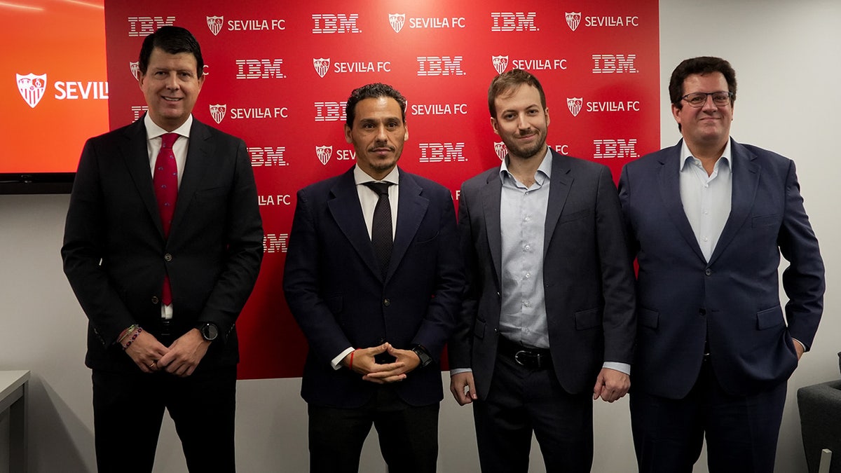 Members of Sevilla FC and IBM pose for picture