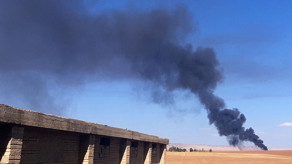 Plume of black smoke