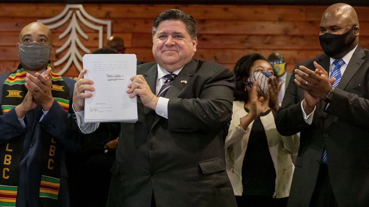 Gov. Pritzker and Rep. Slaughter