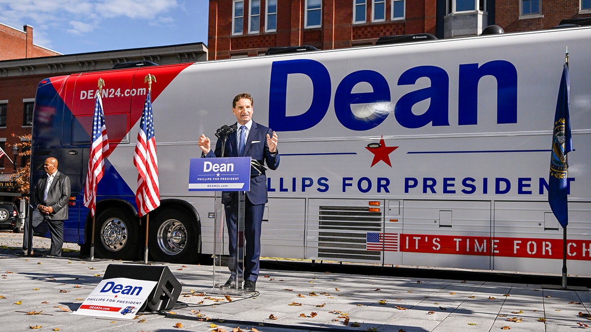 Philips in front of campaign bus in New Hampshire