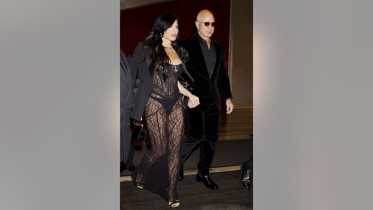 Jeff Bezos and wife Lauren Sanchez are seen during the Milan Fashion Week - Menswear Fall/Winter 2024-2025 on January 13, 2024 in Milan, Italy. (Photo by Robino Salvatore/GC Images)