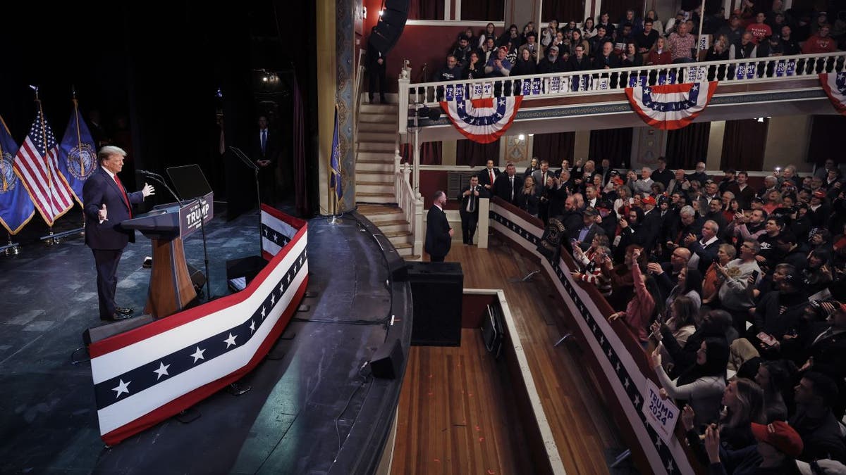 Wideshot of Trump speaking to audience