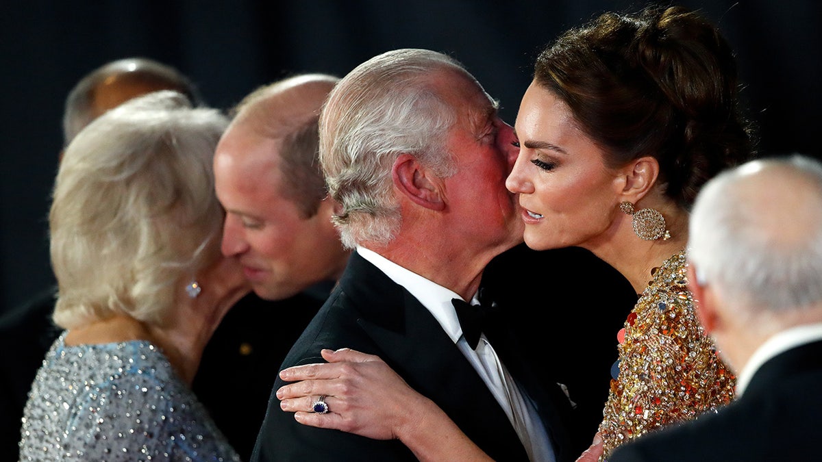 Kate Middleton kissing King Charles on the cheek