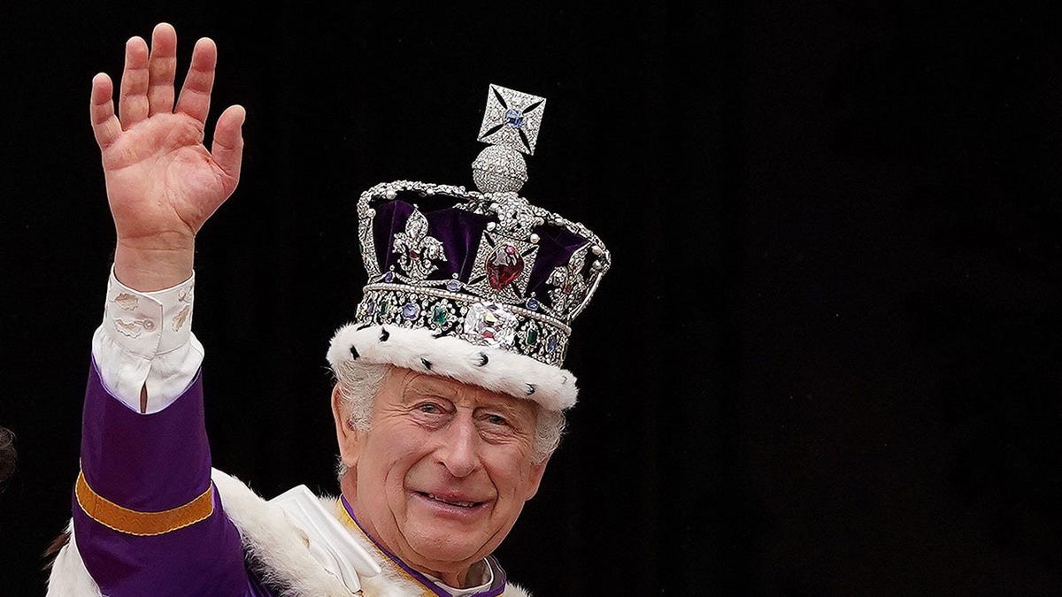 King Charles waving after his coronation