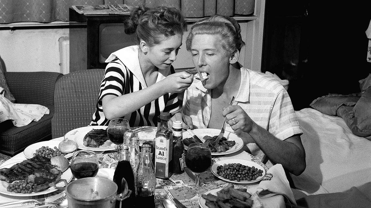 Myra Williams feeding her husband Jerry Lee Lewis