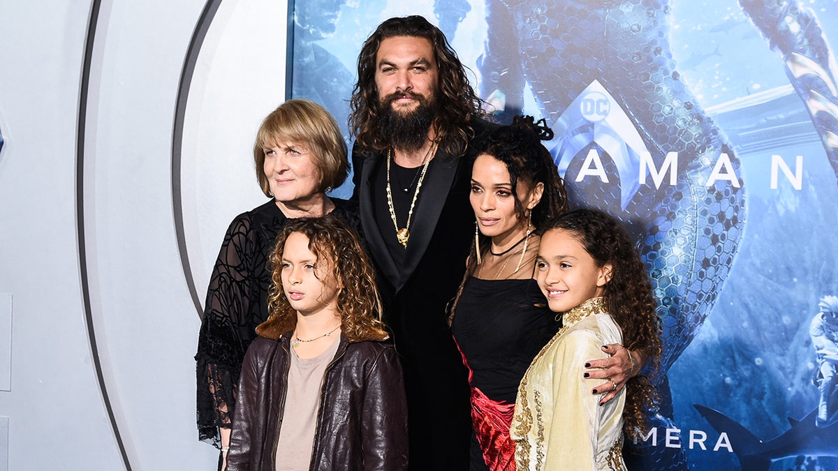 Jason Momoa and Lisa Bonet with family on a red carpet